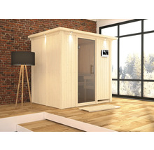 Freistehende Sauna aus Holz mit Glastür und digitalem Bedienfeld in einem hellen Raum.