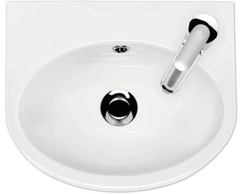 Vue aérienne d''un lavabo blanc avec robinet