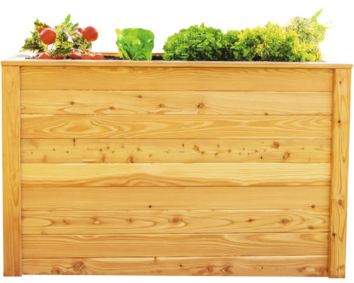 Jardinière surélevée en bois plantée de tomates et de salades