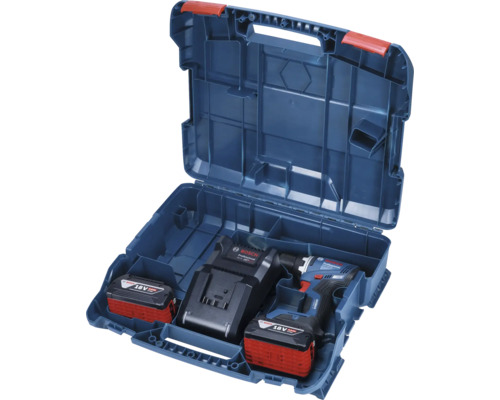Boîte à outils bleue ouverte avec perceuse-visseuse sans fil, batterie et chargeur
