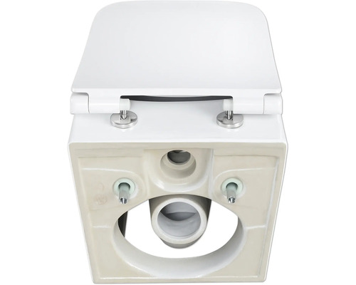 Vue détaillée d''une toilette blanche avec couvercle de toilette par le dessous