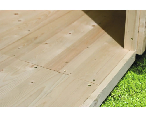 Vue détaillée d''un abri de jardin avec plancher en bois et vis