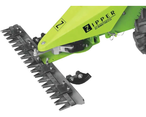 Gros plan du mécanisme de coupe d''une faucheuse à barre de la marque Zipper