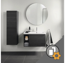 Badezimmer mit Waschbeckenunterschrank, Hochschrank und rundem Spiegel