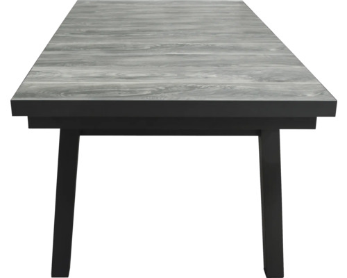 Table de salle à manger avec aspect bois et structure foncée