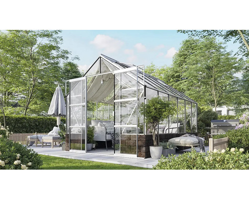 Serre avec mobilier de jardin sur une terrasse