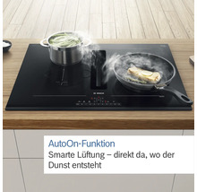 Bosch Kochfeld mit integriertem Dunstabzug unter Kochtöpfen und Bratpfanne