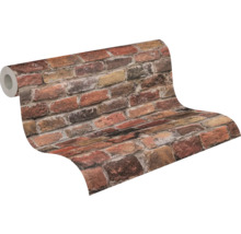Papier peint à motif de briques sur un rouleau
