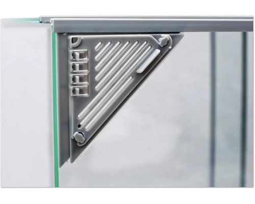 Gros plan d''un raccord d''angle gris sur une plaque de verre