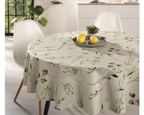 Table ronde avec nappe à motif végétal