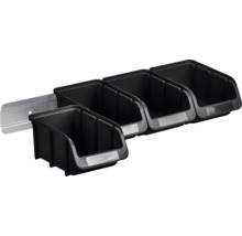Panneau mural noir pour outils avec bacs en plastique pour le rangement des outils.