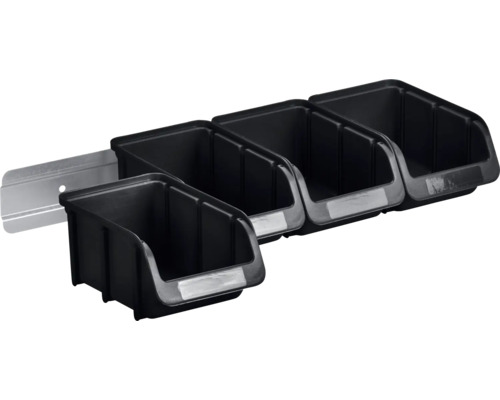 Panneau mural noir pour outils avec bacs en plastique pour le rangement des outils.