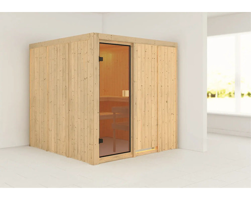 Sauna finlandaise avec porte en verre et murs en bois.