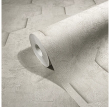 Un rouleau de papier peint avec un motif géométrique.