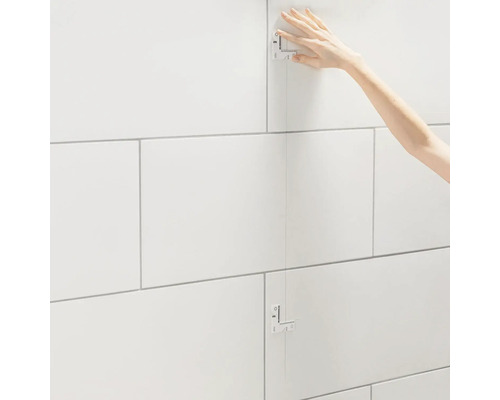 Carreaux avec croisillons et main