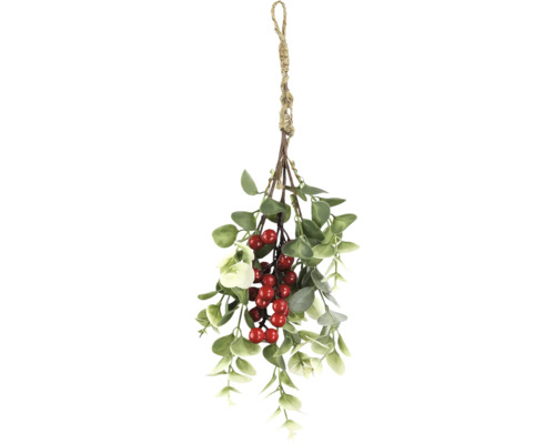 Décoration de Noël suspendue avec des baies et des feuilles sur une corde