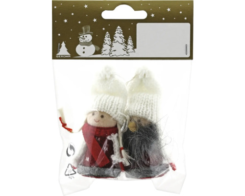Zwei dekorative Figuren in einer Verpackung mit weißen Mützen und Filzkleidung als Weihnachtsdekoration.