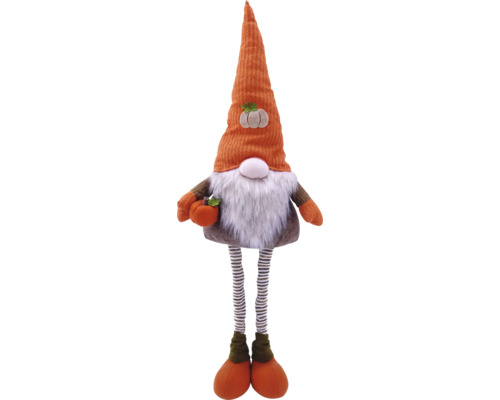 Nain d''automne décoratif avec des jambes rayées et une citrouille à la main