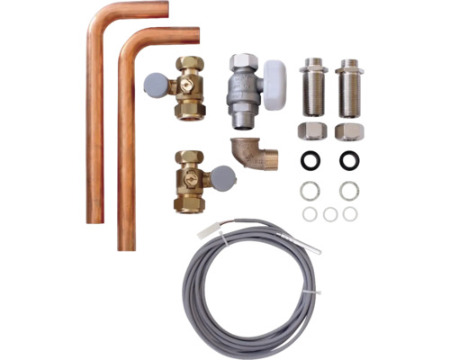 Kit de raccordement de radiateur avec tubes en cuivre, robinets et accessoires pour l'installation d'un radiateur.
