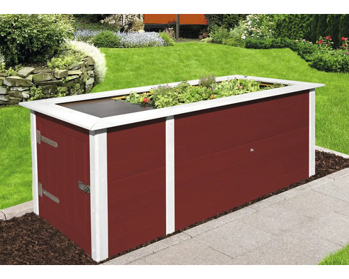 Jardinière surélevée en bois avec des plantes dans le jardin