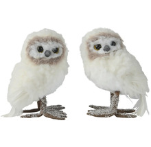 Deux hiboux blancs en tissu comme décoration