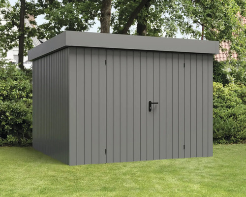 Abri de jardin gris sur une pelouse