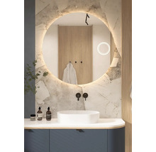 Salle de bain moderne avec miroir rond, vasque à poser et robinetterie