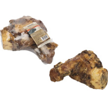 Deux os de peau de bœuf pour chiens, un emballé et un non emballé