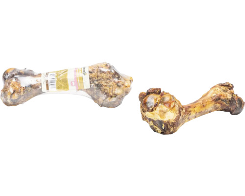 Deux os pour chiens, un emballé et un non emballé.