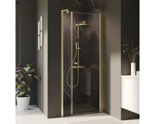 Porte de douche dans une niche avec porte pivotante sur partie fixe BREUER Elana 2.0 ronde 120 cm profilé gold verre transparent tirant gauche Porte de douche dans une niche avec porte pivotante sur partie fixe BREUER Elana 2.0 ronde 120 cm profilé gold verre transparent tirant gauche