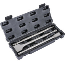 Jeu de burins dans une valise noire