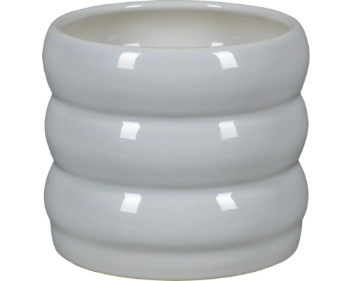 Pot de fleurs en céramique avec un design côtelé