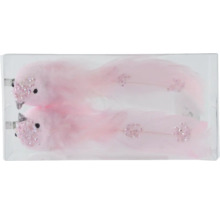 Deux oiseaux décoratifs roses avec des plumes dans un emballage transparent.