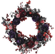 Dekorativer Herbstkranz mit Kürbissen und Beeren