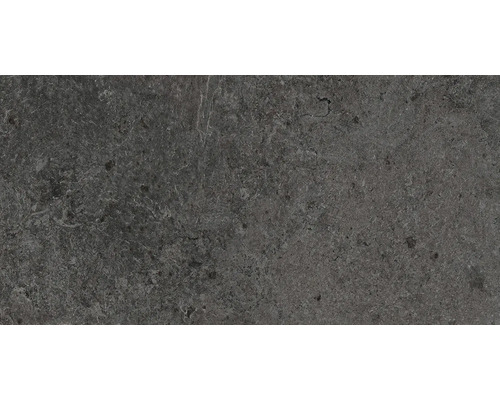 Detailaufnahme einer grauen Keramikfliese mit matter Oberfläche