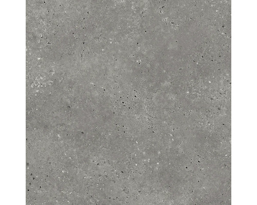 Nahaufnahme einer grauen Betonfliese mit strukturierter Oberfläche.