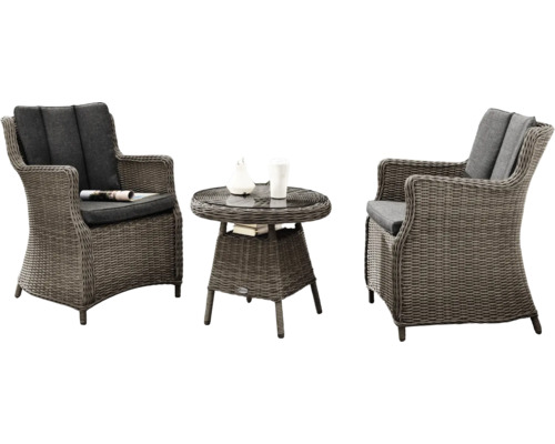 Ensemble de jardin avec deux fauteuils en rotin et une table avec plateau en verre