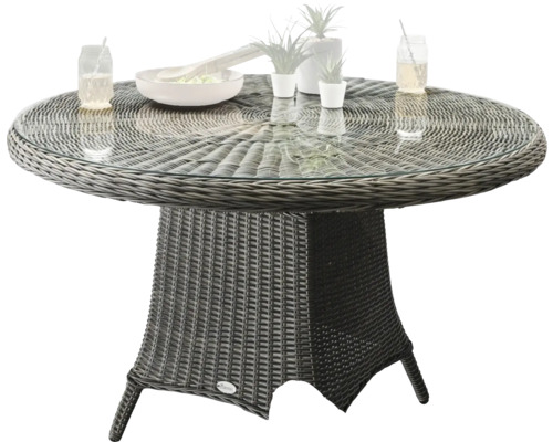 Table de jardin ronde avec plateau en verre et structure en rotin