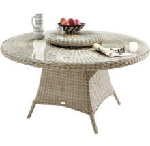 Table de jardin avec aspect rotin, plateau en verre et forme ronde pour l''extérieur