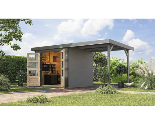 Abri de jardin avec porte ouverte et auvent dans le jardin