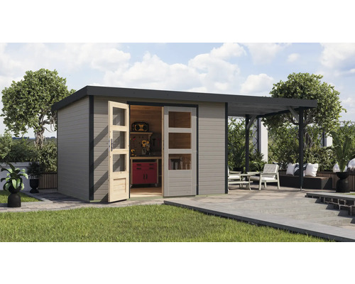 Scène de jardin avec remise, établi et coin salon