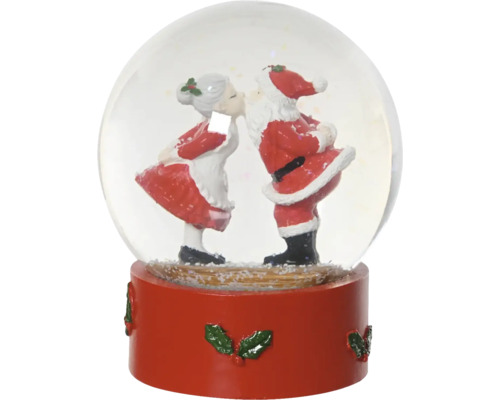Boule à neige avec le père Noël et la mère Noël qui s’embrassent