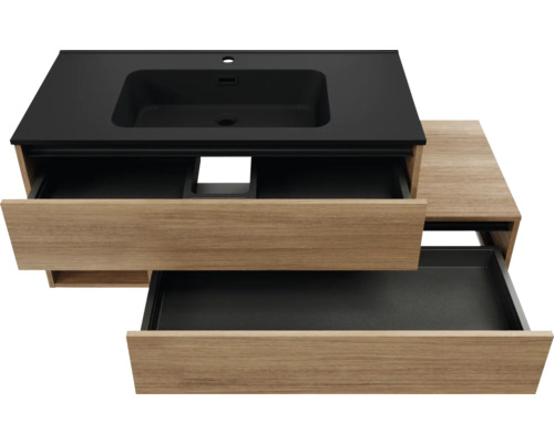 Meuble sous-vasque avec deux tiroirs ouverts et lavabo noir