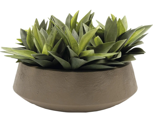 Plante artificielle avec feuilles vertes dans un pot marron