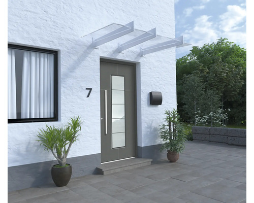 Eingangsbereich eines Hauses mit Haustür, Briefkasten und Vordach