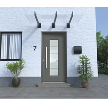 Porte d''entrée avec auvent et boîte aux lettres sur une façade