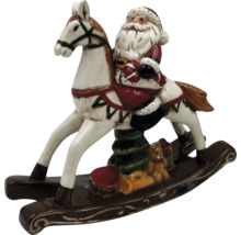 Weihnachtsmann auf Schaukelpferd Dekoration