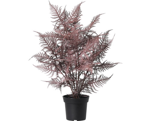 Fougère de plante artificielle dans un pot noir