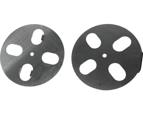Deux plaques de recouvrement rondes en métal avec évidements