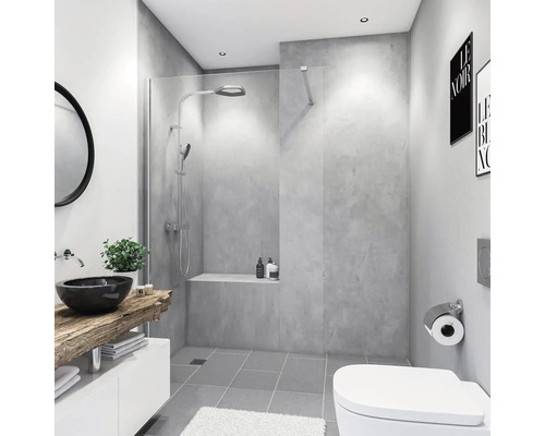 Salle de bain moderne avec douche, lavabo à poser et toilettes.